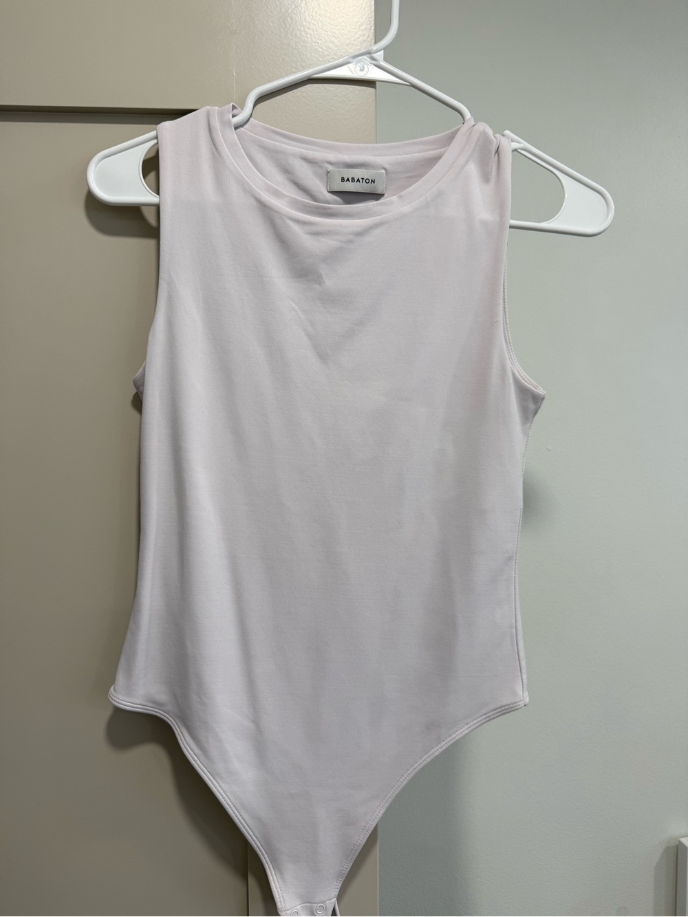 Babaton Sleeveless Pale Pink Stretch Bodysuit